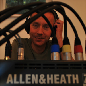 martin listening through headphones
