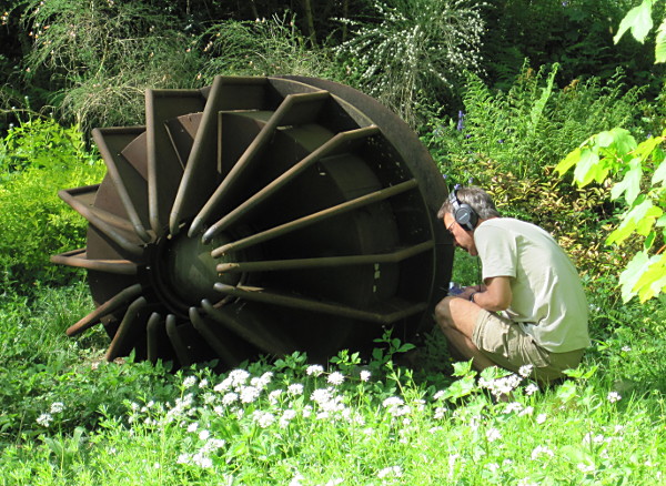 martin recording the sound of a metal sculpture