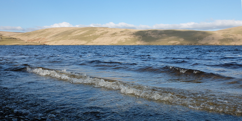 Waves on the Claerwen reservoir in the March sunshine