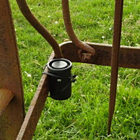 film cam camera on old hay rake